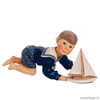 Carl Larsson barn - Gutt med seilbåt