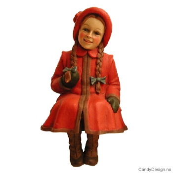 Pike sittende med fletter