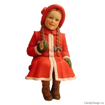 Pike sittende med fletter