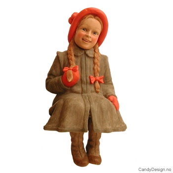 Pike sittende med fletter