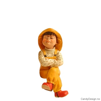 Barnehagebarn sittende på kant