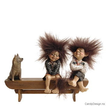 Two minitrolls on bench with dog