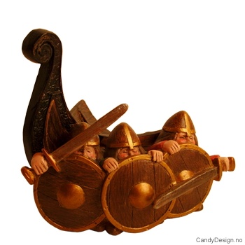 3 Vikings without horns and part of ship