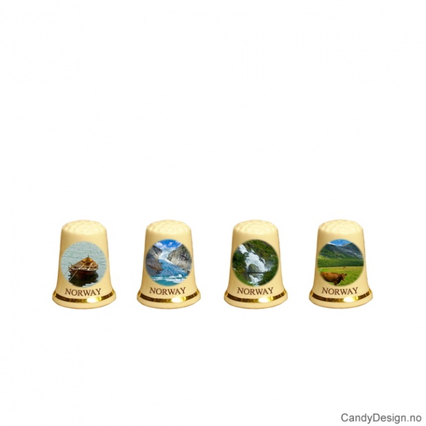 Assorted souvenir thimbles with Norwegian nature motifs